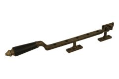 Fensterfeststeller Messing patiniert Ebenholz (1890)