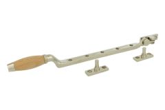 Fensterfeststeller Messing vernickelt Buchenholz (1930)