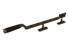 Fensterfeststeller Messing patiniert Ebenholz (1918)